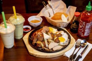 Sizzling Steak, Fried Egg, & Pate with a Baguette